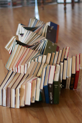 pictures of books artistically stacked in a spiral