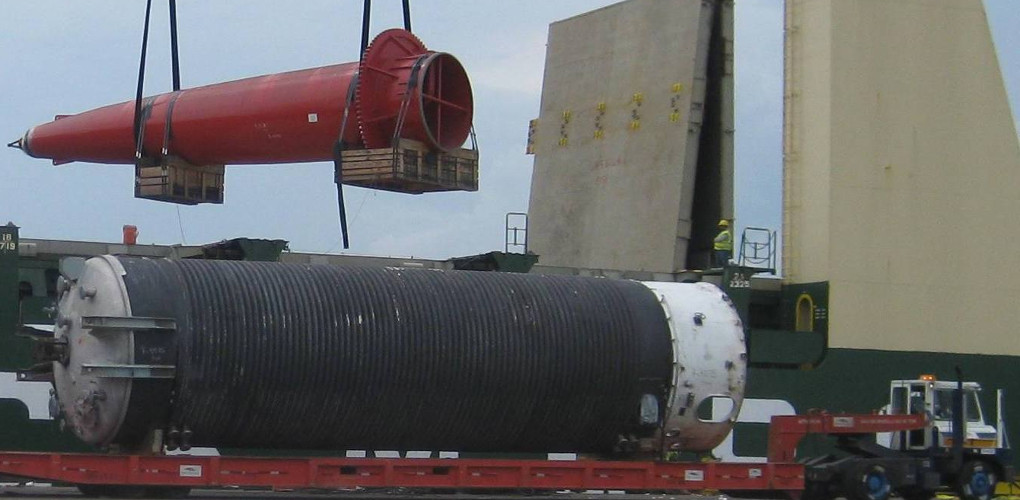 Large equipment on truck at dock